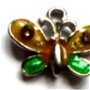 Charm metalic fluture galben si verde cu strasuri din sticla pe baza argintie