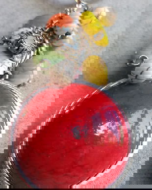 Breloc handmade cu diferite margele din howlit si diferite charm-uri din aliaj tibetan