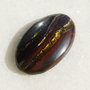 Cabochon Iron Tiger Eye aprox 30x27.5x5 mm