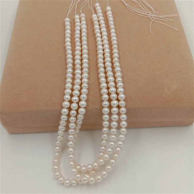 Perle naturale rotunde 6-7mm cu 2 gauri (1bucata)