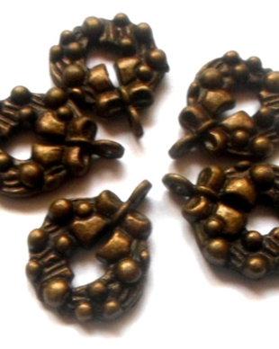 Charm metalic coronita de Craciun bronz
