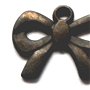 Charm metalic fundita cu oval bronz