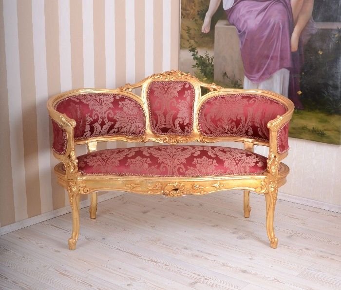 Sofa din lemn masiv auriu cu tapiterie rosie
