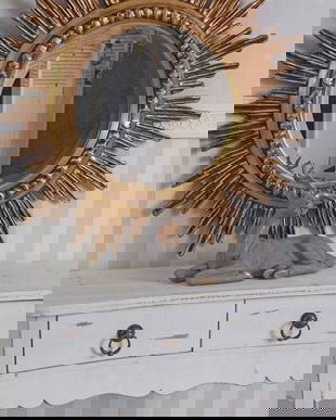 Oglinda soare cu o rama aurie