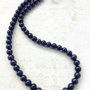 Colier perle de cultura negre cu reflexii indigo