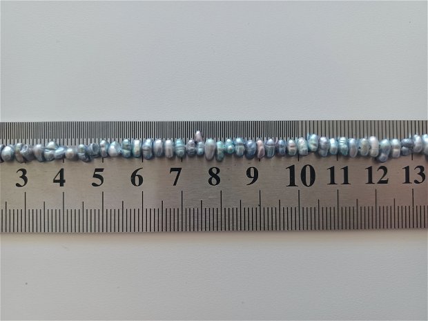 Perle negre 2x4,5mm - 1 buc