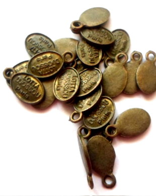 Charm metalic banut oval LOTTA DJOSSOU PARIS bronz