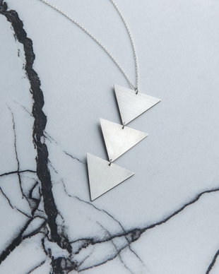 "Forward" pendant