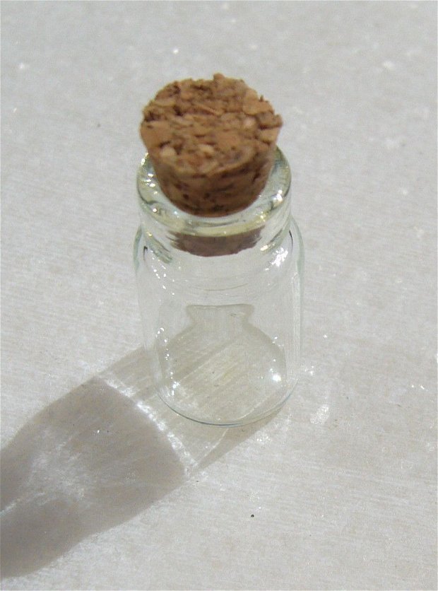 Sticluta aprox 10x19 mm (23 mm cu dopul din pluta)