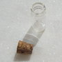 Sticluta aprox 11x22 mm (27 mm cu dopul din pluta)