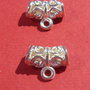 Agatatoare pandant tip tub din aliaj tibetan perforat argintat aprox 10x12 mm