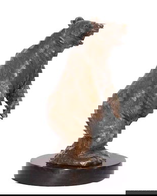 Urs -statueta din bronz pe un soclu din marmura