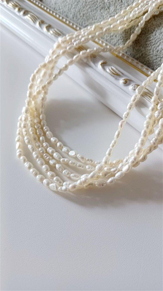 Perle albe ovale 3x4mm - 1 buc