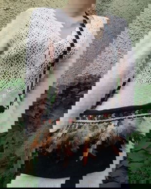 Poseta din piele, cu pene