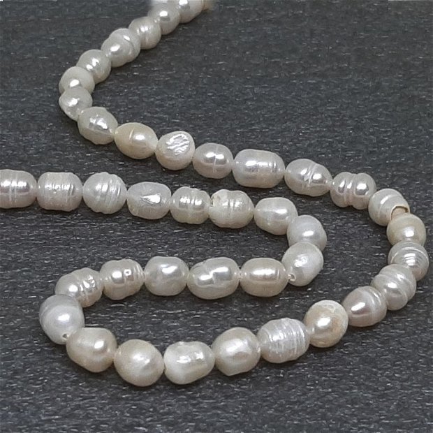 Perle de cultura ovale 5x8mm (calitateAB) (33cm)		MG.0111