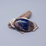 Brosa pandantiv vintage, din bronz auriu si cabochon de lapis cu insertii cuprifere