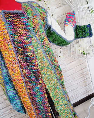 Cardigan sfâșiat de razele soarelui