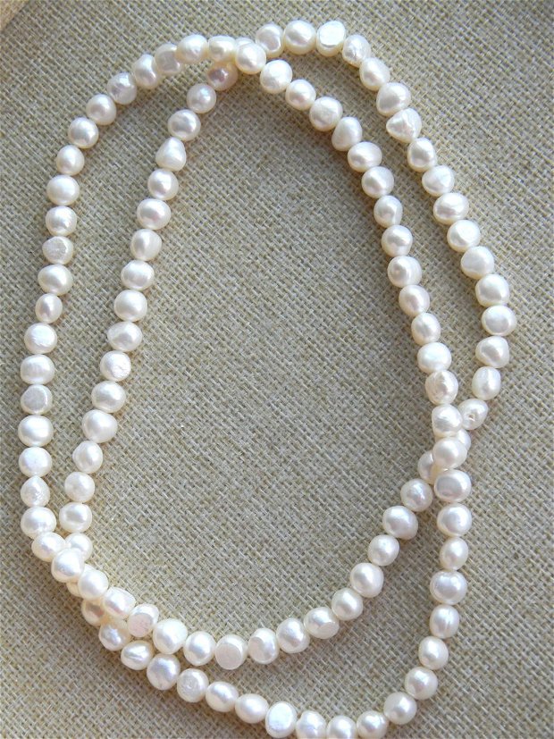 Perle naturale (PGA)
