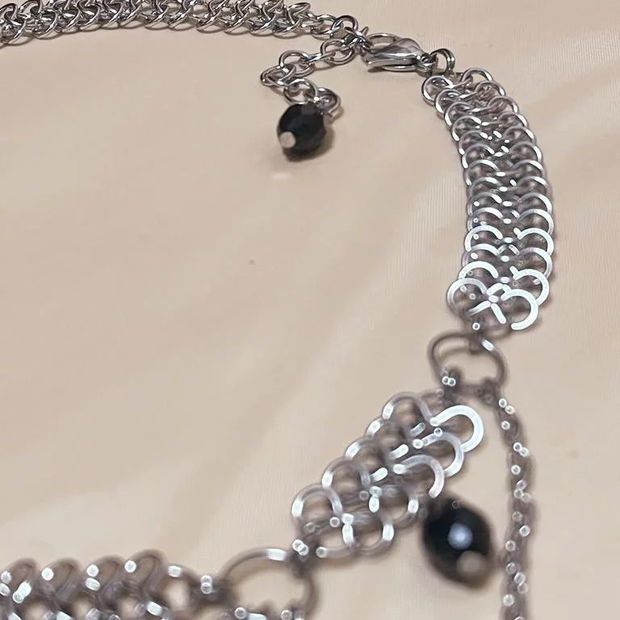 Black and silver dangly collar