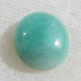 Cabochon oval mic din smarald aprox 6.5x5.5x2.5 mm