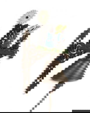 Clopot de usa din fonta cu o moara de vant