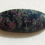 Cabochon eudialit (INDIA - lucrat manual) aprox 40x18.5x4.8 mm