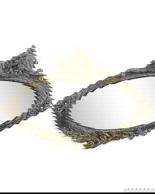 Oglinda ovala cu o rama din fonta