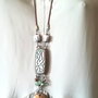 Colier boho lung cu pandantiv antichizat cu arabescuri