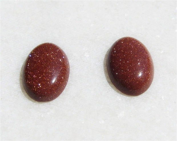 (2 bucati) Cabochon oval din brown goldstone aprox 14x10x4 mm