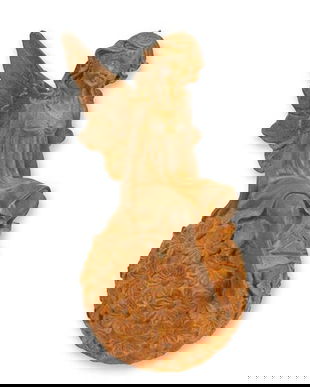 Zana pe o minge-statueta din fonta antichizata