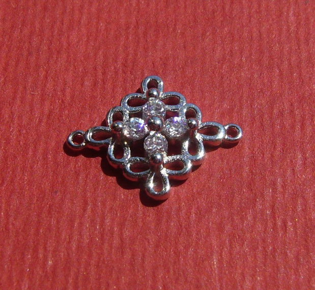 Link cu zirconii din argint .925 rodiat aprox 12x15 mm (cu anourile)