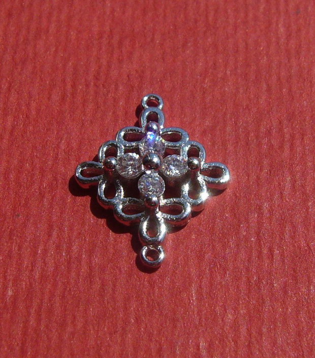 Link cu zirconii din argint .925 rodiat aprox 12x15 mm (cu anourile)