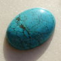 Cabochon turcoaz reconstituit aprox 40x30x7.5 mm
