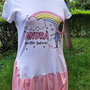 Rochie andra tutto bene accanto all'arcobaleno