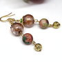 Cercei tomnatic cu jad ,margele lampwork si lava /inox auriu