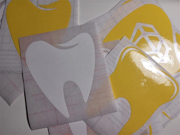 Stickere in forma de dinte/molar