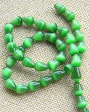 Margele "ochi de pisica" 11x8 mm