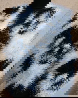 Vesta blana artificiala