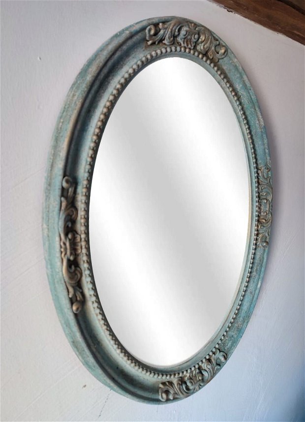 Oglinda ovala cu rama decorativa
