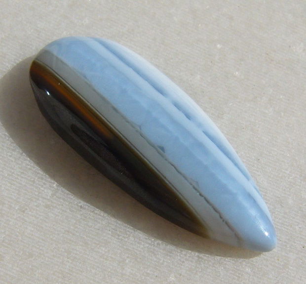 Cabochon din blue opal (lucrat manual in India) aprox 6x14x37.5 mm