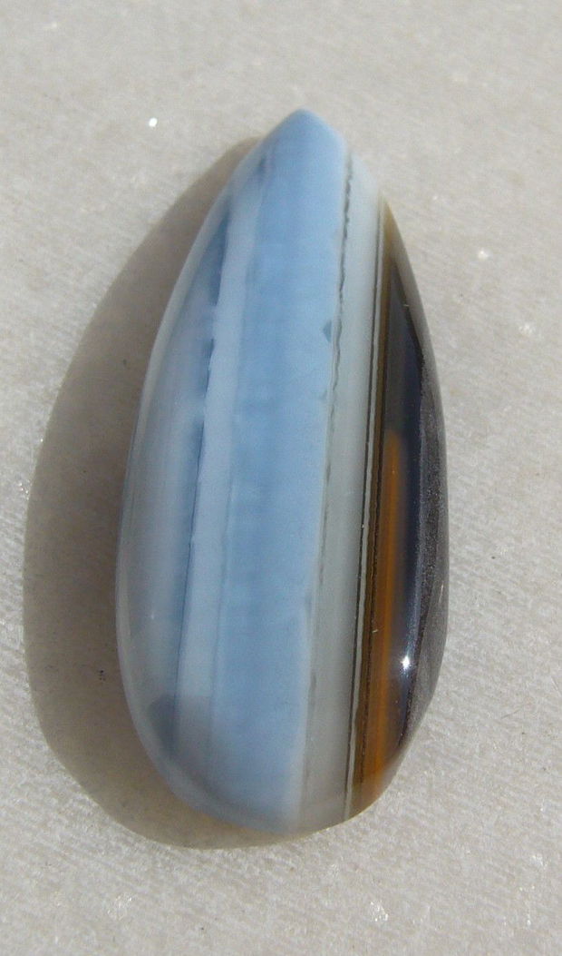 Cabochon din blue opal (lucrat manual in India) aprox 6x14x37.5 mm