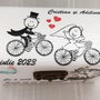 Cutiuta de verighete cu miri pe bicicleta