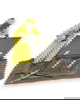 Arab pe un covor-statueta din bronz pictat