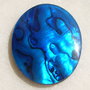 Cabochon din scoica paua abalone naturala acoperita cu un strat protector din rasina aprox 39.5x30.5x4 mm