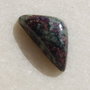 Cabochon eudialit (INDIA - lucrat manual) aprox 24x12x5.5 mm