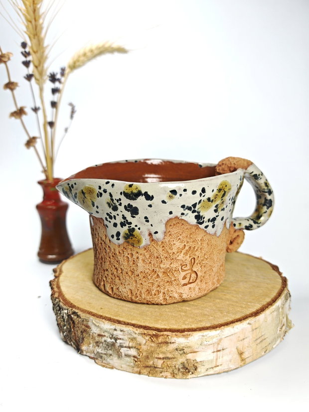 Canuta din ceramica pentru lapte