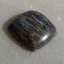 Cabochon rubin in fucsit (INDIA - lucrat manual) aprox 11.5x11x5 mm