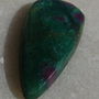 Cabochon rubin in fucsit (INDIA - lucrat manual) aprox 28x13.5x4 mm