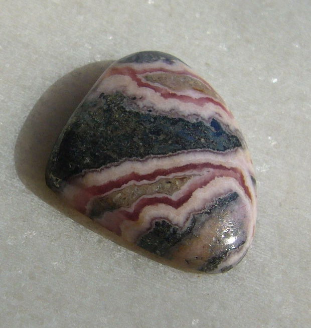 Rodocrozit cabochon aprox 26.5x21x6.4 mm