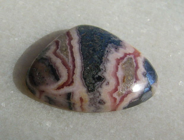 Rodocrozit cabochon aprox 26.5x21x6.4 mm